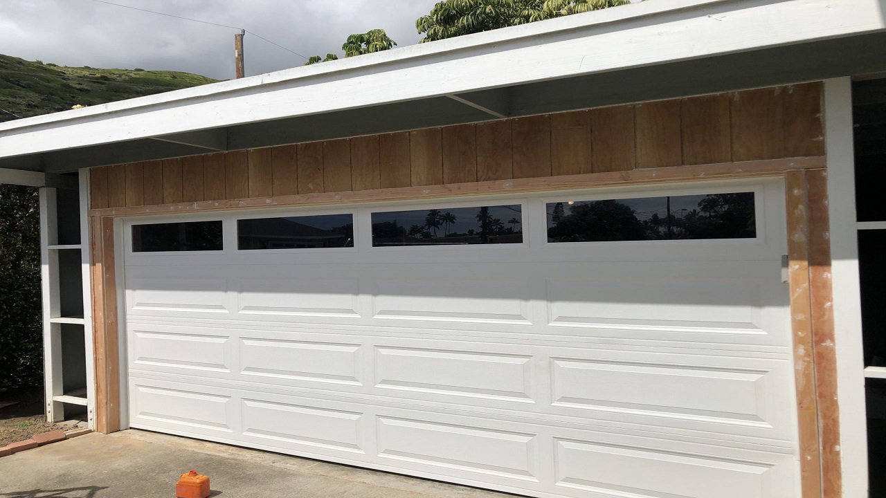 Maximizing Space: Raised Panel Garage Doors for Tighter Driveways